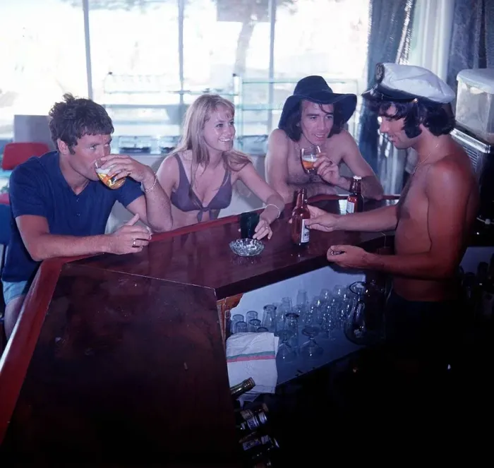 Framed Print : George Best Football serves drinks up to Susan George Actress Framed Print : George Best Football serves drinks up to Susan George Actress