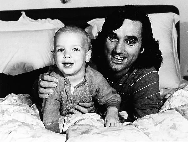 George Best football with his son Calum in 1982