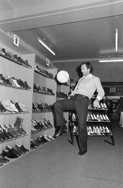 George Best, Footballer, makes a guest appearance at a shoe shop, Glasgow, Scotland