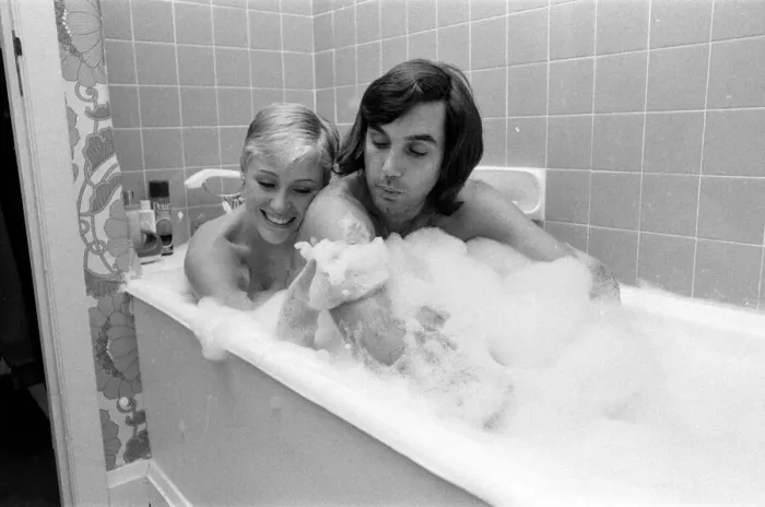 Framed Print : George Best and his girlfriend Angela Macdonald - James pictured at the London home Framed Print : George Best and his girlfriend Angela Macdonald - James pictured at the London home