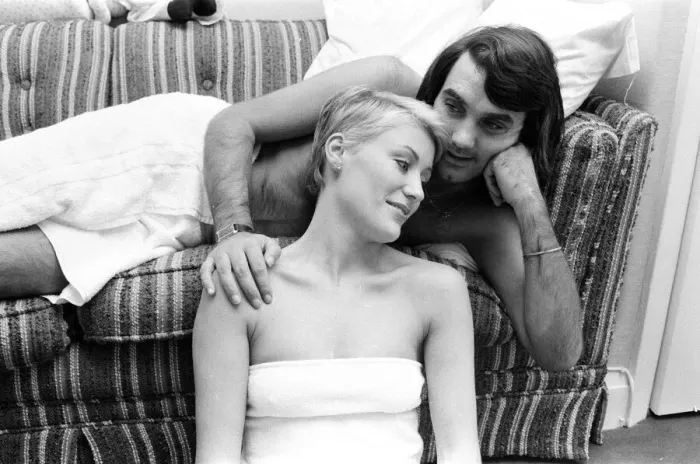 Framed Print : George Best and his girlfriend Angela Macdonald - James pictured at the London home of George Best. Angela later married George to become Angie Best. Picture taken 23rd September 1976George Best and his girlfriend Angela Macdonald - Janes