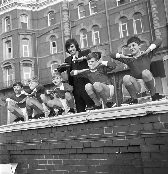 George Best with kids from a Childrens Home pictured outside the home