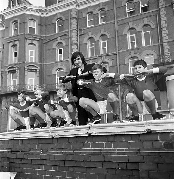 George Best with kids from a Childrens Home pictured outside the Imperial Hotel