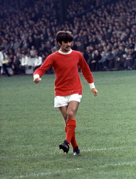 George Best Manchester United football player, warns up ahead of local derby match at