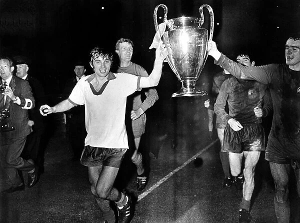George Best Manchester United parading the European Cup after beating Benfica at Wembley