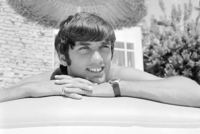 Framed Print : George Best relaxing on an inflatable bed whilst on holiday April 1967 Framed Print : George Best relaxing on an inflatable bed whilst on holiday April 1967