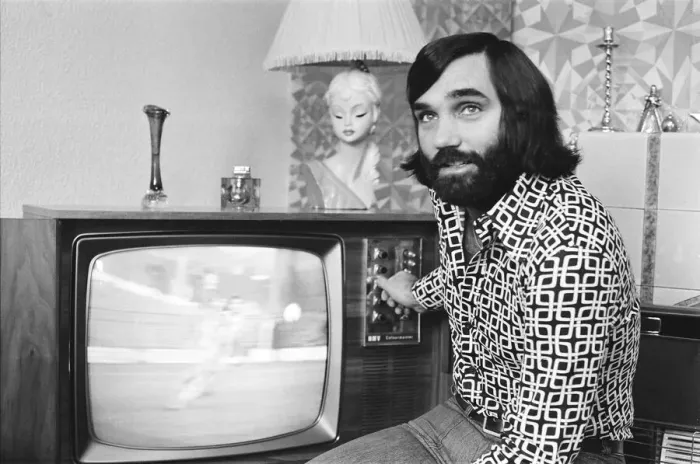 Framed Print : George Best seen here at his Manchester home after rumours that Stoke manager Tony Framed Print : George Best seen here at his Manchester home after rumours that Stoke manager Tony