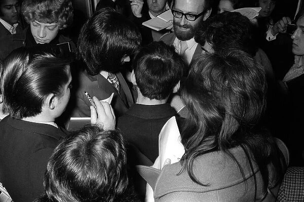 George Best signs autographs for fans April 1971