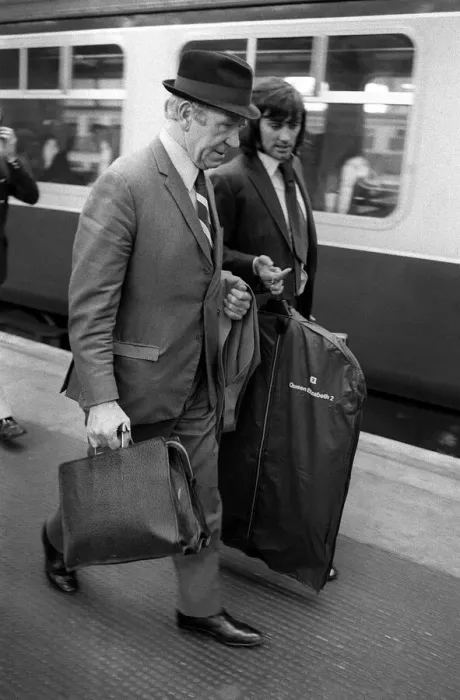 Framed Print : George Best and Sir Matt Busby on railway platform 1971 after George had been sent Framed Print : George Best and Sir Matt Busby on railway platform 1971 after George had been sent