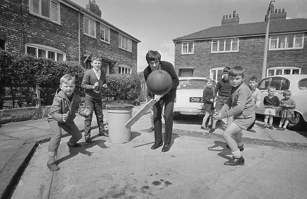 George Best voted footballer of the year. OPS shows him playing cricket with some