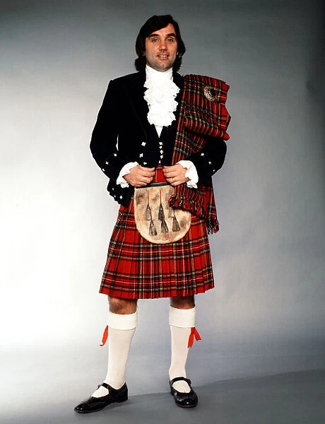 George Best wearing a kilt after signing for Hibernian. 24th November 1979