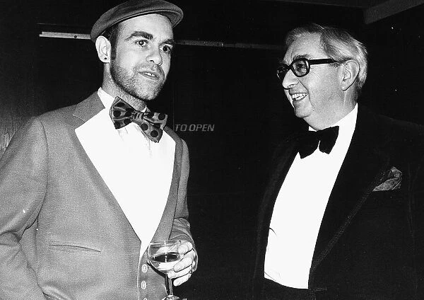 George Brown MP with singer Elton John