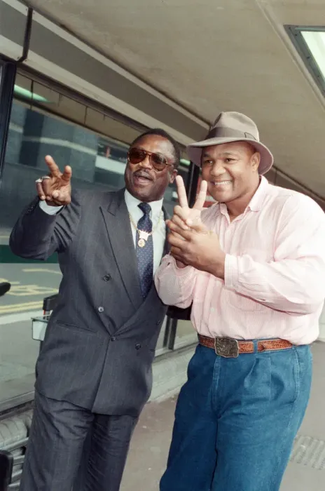 Framed Print : George Foreman and Joe Frazier at London Airport. 16th October 1989