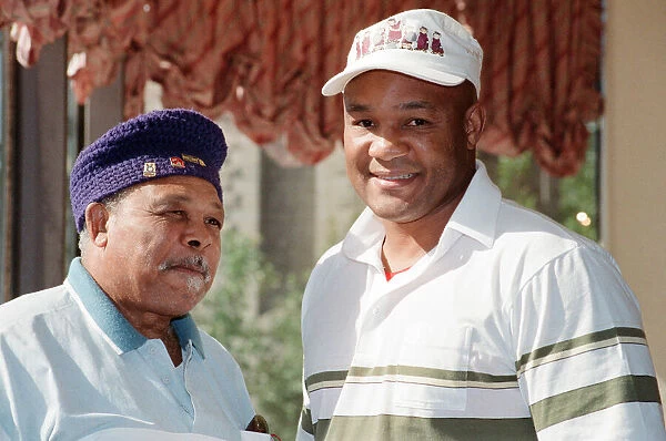 George Foreman pictured with Archie Moore. Tomorrow Foreman is fighting Terry Anderson at