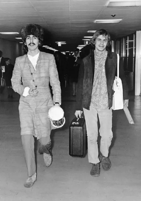 Framed Print : George Harrison and Beatles associate Alexis Mardis (aka Magic Alex) at London Airport