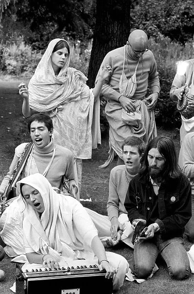 George Harrison of the Beatles pictured amongst the Buddhist American group