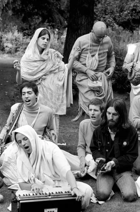 Framed Print : George Harrison of the Beatles pictured amongst the Buddhist American group Framed Print : George Harrison of the Beatles pictured amongst the Buddhist American group