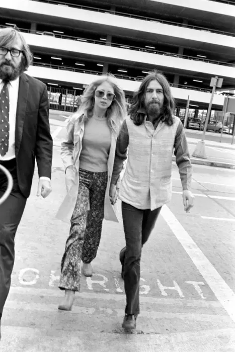 Framed Print : George Harrison of the Beatles with his wife Pattie at Heathrow today after seeing offhis Framed Print : George Harrison of the Beatles with his wife Pattie at Heathrow today after seeing offhis