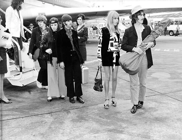 George Harrison with wife Patti Boyd, Ringo Starr with wife Maureen & Peter Asher