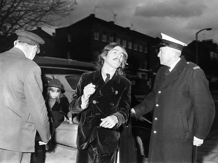 Framed Print : George Harrison and wife Patti Boyd arrive at the memorial service for Beatles manager