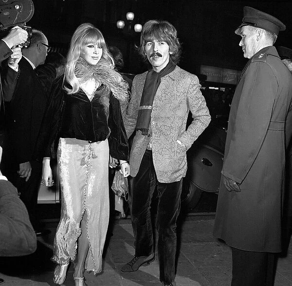 George Harrison and wife Patti Boyd arriving at the film premiere of '