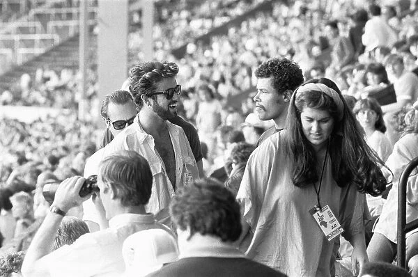 George Michael in the audience during the opening of the Live Aid Concert at Wembley
