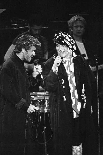 George Michael and Boy George performing at the Stand by Me