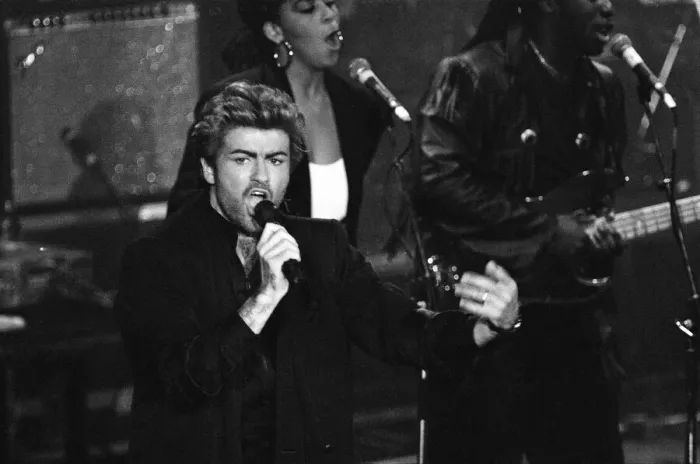 Framed Print : George Michael performing at the Stand by Me: AIDS Day Benefit concert at Wembley Arena Framed Print : George Michael performing at the Stand by Me: AIDS Day Benefit concert at Wembley Arena