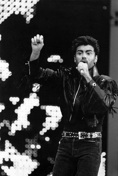 George Michael of pop duo Wham! performing on stage. 23rd September 1986