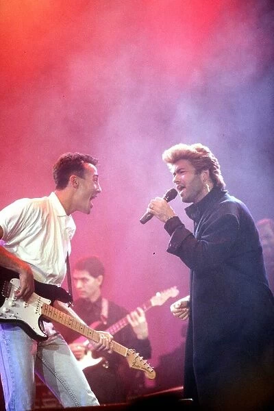 George Michael on stage at an AIDS concert at Wembley Arena