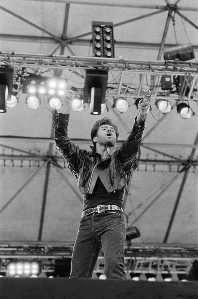 George Michael of Wham ! gets the crowd going at The Farewell Concert at Wembley Stadium