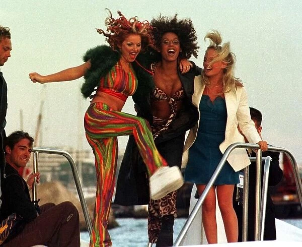 Geri Halliwell with Mel B and Emma Bunton of pop group Spice Girls at Cannes Film