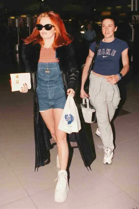 Framed Print : Geri and Mel C of the Spice girls leave Heathrow for Paris 1997 Framed Print : Geri and Mel C of the Spice girls leave Heathrow for Paris 1997