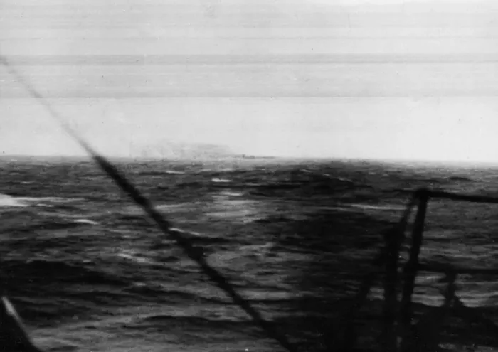 Framed Print : The German battleship Bismarck burns on the horizon approximately 350 miles west of