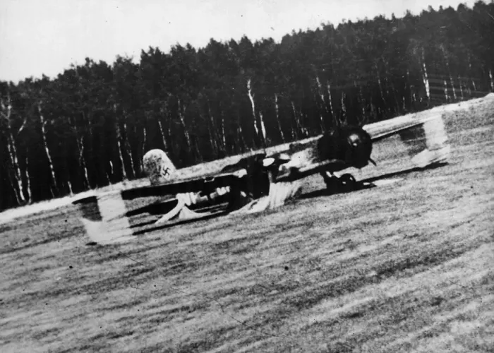 Framed Print : A German bomber on a Brandenburg airfield being strafed by Captain Nicolas Magura in his