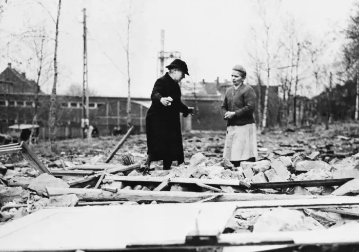 Framed Print : A German civilian views wreckage of her home that was destroyed by a German artillery Framed Print : A German civilian views wreckage of her home that was destroyed by a German artillery