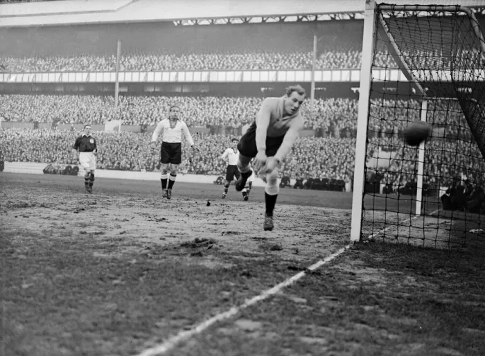 Framed Print : The German goalkeeper, Jacob, in action against England in an international football Framed Print : The German goalkeeper, Jacob, in action against England in an international football