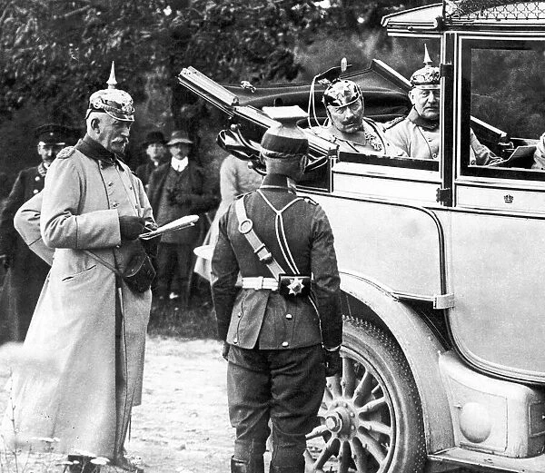 German Kaiser Wilhelm II seen here with General Moltke receiving a report from an officer