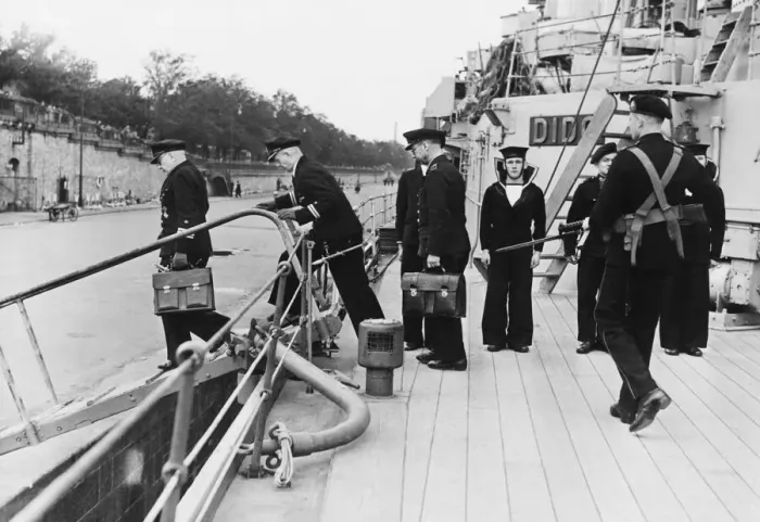 Framed Print : German naval officers followed by a Royal Marine armed sentry when leaving HMS Dido Framed Print : German naval officers followed by a Royal Marine armed sentry when leaving HMS Dido