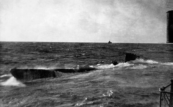 A German U-Boat sinking following an attack by destroyers