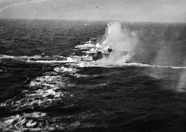A German U-boat sinking in the Kattegat after an attack by Mosquitos of R. A. F