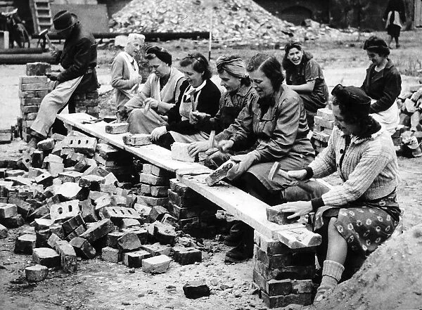 German women recycle bricks to help rebuild Berlin after WW2 circa 1945