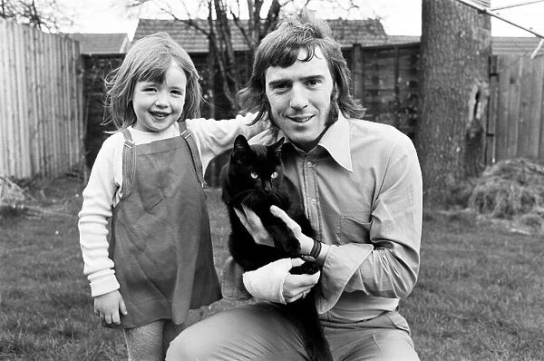 Gerry Pendrey with his 5 year-old daughter Karen Pendrey and lucky black cat '