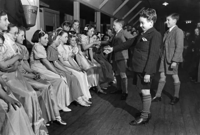 Framed Print : Getting partners at Balloon Dancing at Children Camp, near Hindhead, Surrey. May 1941 Framed Print : Getting partners at Balloon Dancing at Children Camp, near Hindhead, Surrey. May 1941