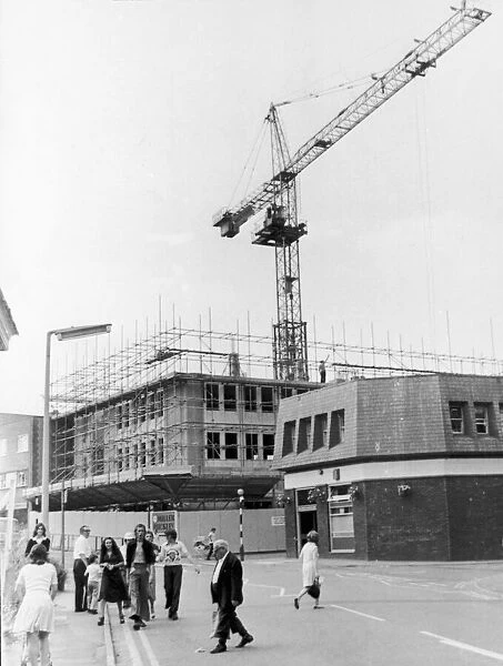 A giant crane towers above the Post Office in King Street as the latest part of