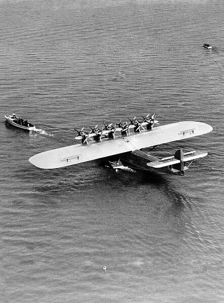 A giant Dormier Do-X seaplane being towed into position before starting on its
