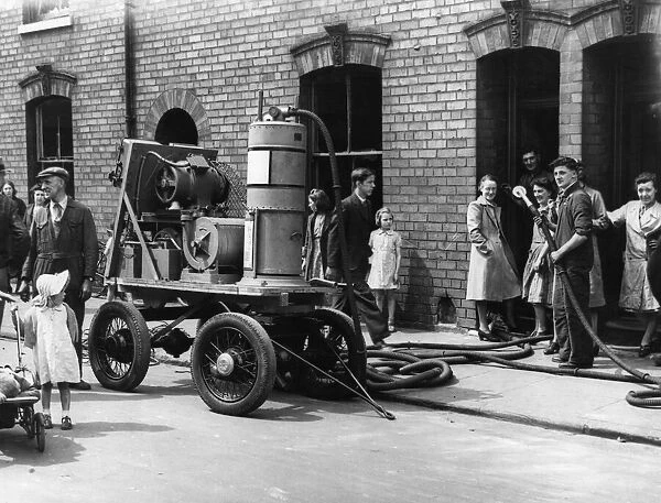 Giant vacuum cleaner seen here during the clean up following the Luftwaffe raid on Hull