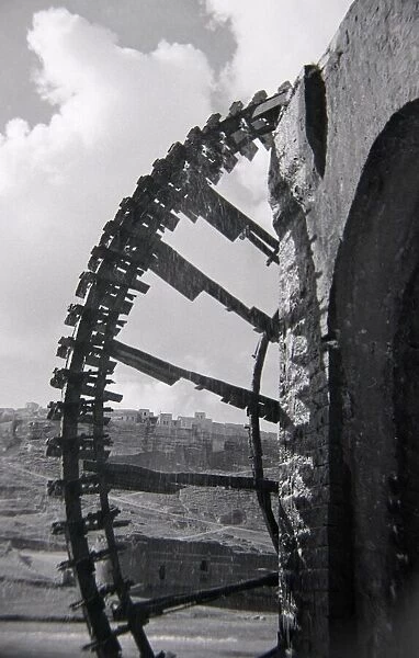 A giant water wheel used to irrigate the fields around the Northern Syrian town of Rastan