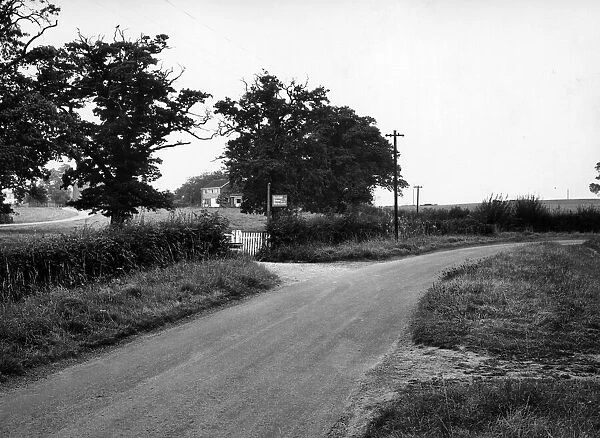 Gibbet Hill Road, looking across to Cryfield House Farm