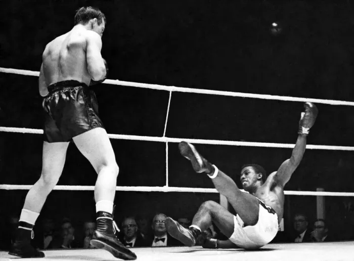 Framed Print : Gibbs hits the canvas. After Johnny Pritchett had connected with a right in the 3rd round